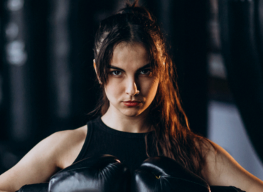 Woman Boxer Training Gym